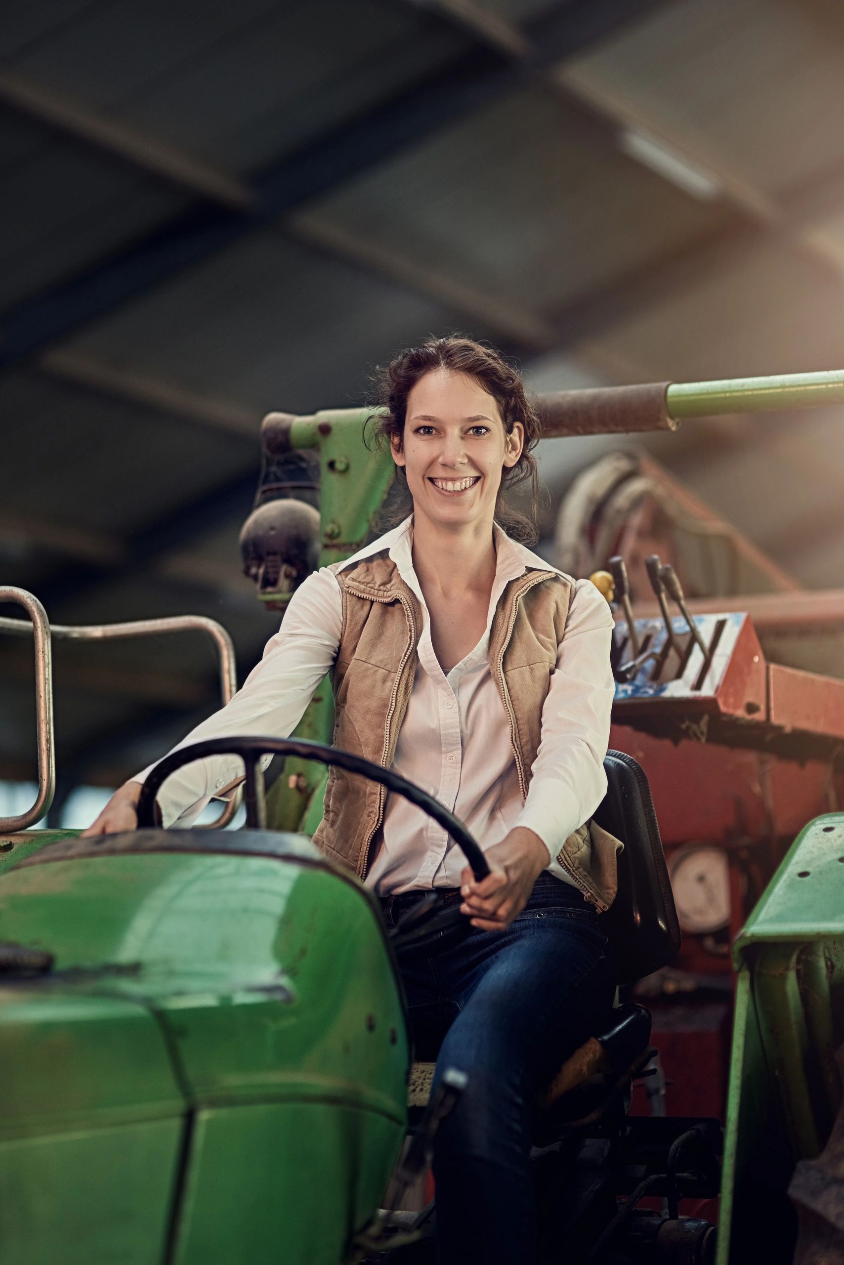 Production manager portrait on farm equipment